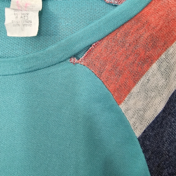 Turquoise striped sweater tunic with small tear as shown. Size Large - Picture 2 of 3